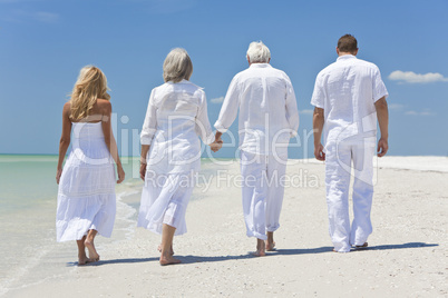 Four People, Two Seniors, Family Couples, Walking On Tropical Be