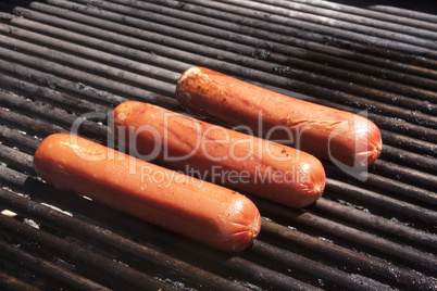 Hot dogs on a bbq