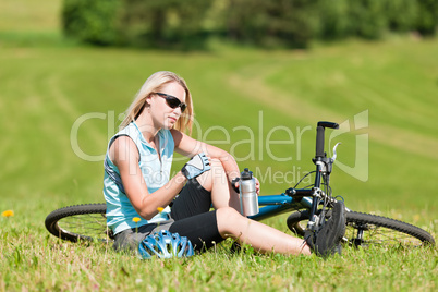 Sport mountain biking girl relax in meadows