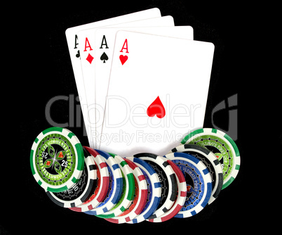 Cards and ultimate poker chips on black