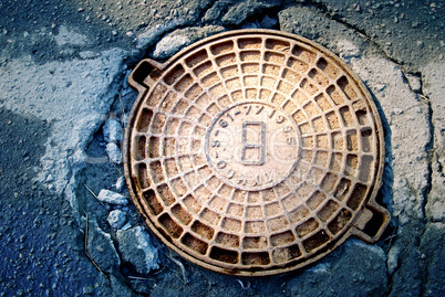 Rusty manhole cover