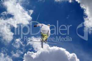 Freestyle ski jumper with crossed skis