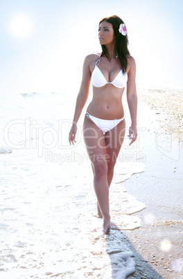 woman in bikini at sea beach