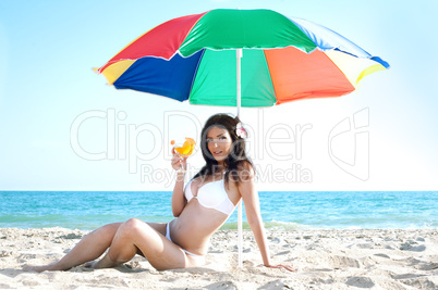 woman in bikini at sea beach