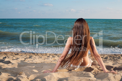 young beauty woman on sea