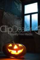 halloween pumpkin in night on old wood room