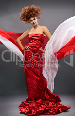 beauty redheaded girl in fashion dress
