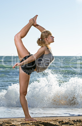 Beautiful young woman doing fitness exercise