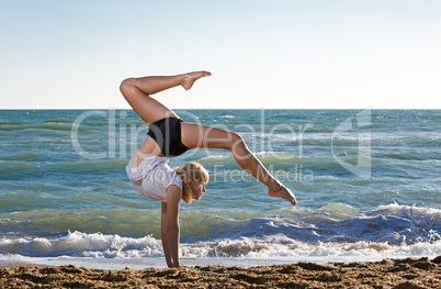 Beautiful young woman doing fitness exercise