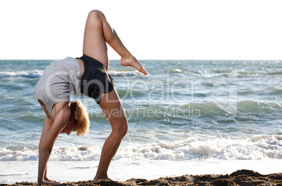 Beautiful young woman doing fitness exercise