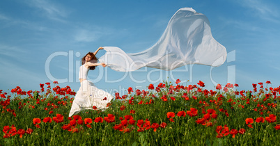 beauty woman in poppy field with tissue