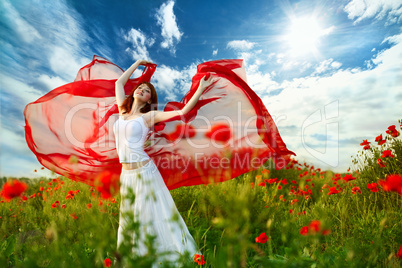 beauty woman in poppy field with tissue