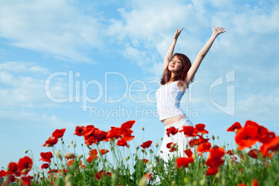 beauty woman in poppy field