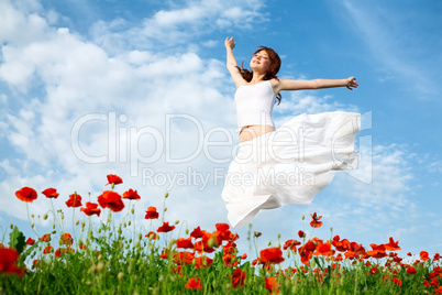 beauty woman in poppy field