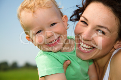 Child with mother play outdoors