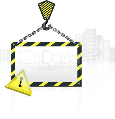 Crane hook with blank poster on the background buildings