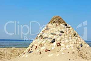 Pyramid of sand and shells