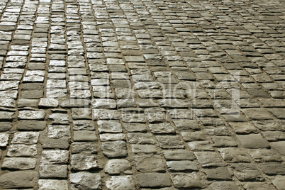 Urban square covered with cobblestone