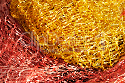 Yellow and red plastic mesh