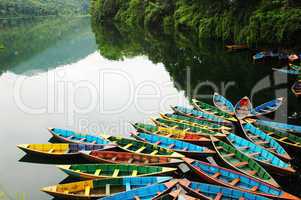 Colorful tour boats at lakeside