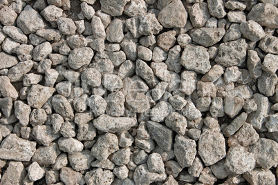 Many small grayish stones