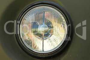 Old car round headlight