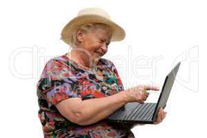 Seniorin mit einem Computer