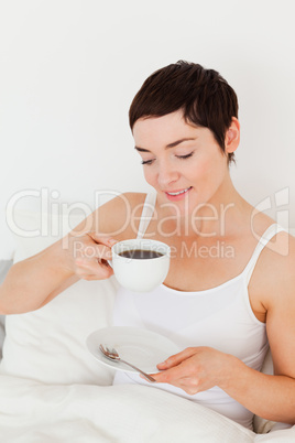 Portrait of a woman drinking coffee