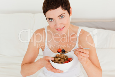 Lovely woman having breakfast