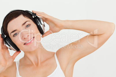 Close up of a lovely woman listening to music