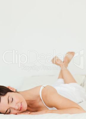 Portrait of a woman lying on her belly