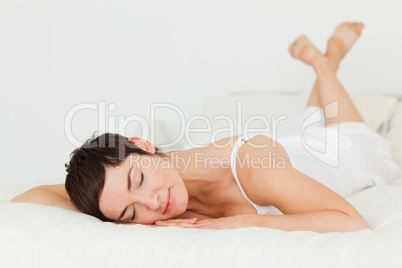 Close up of a woman lying on her belly
