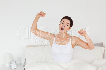 Close up of a woman stretching her arms