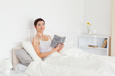 Young woman reading a book