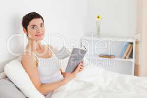 Young woman holding a book