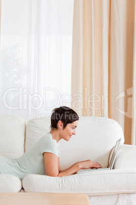 Portrait of a short-haired woman using a laptop