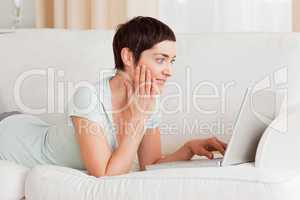 Surpised woman using a laptop