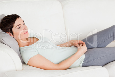 Woman lying on a couch