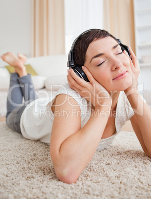 Portrait of a serene woman listening to music