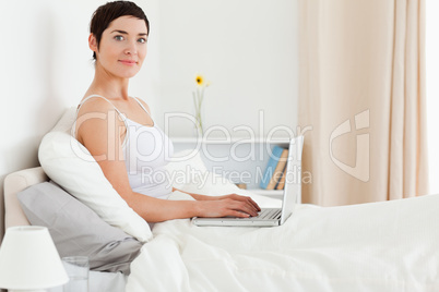 Cute woman using a laptop