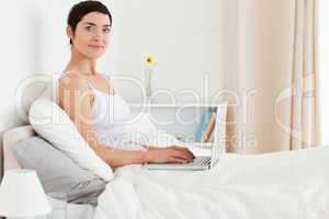 Cute woman using a laptop