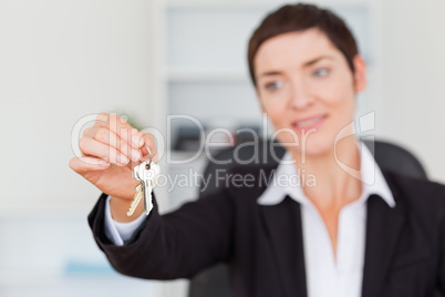 Woman showing keys