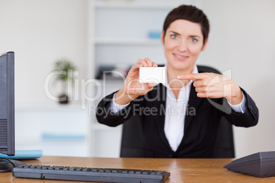 Secrertary showing a blank business card
