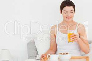 Woman drinking orange juice