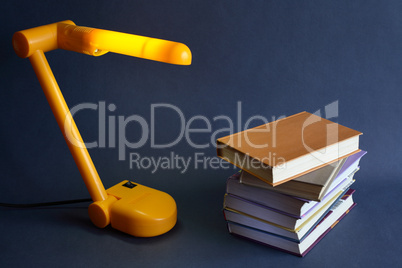 Books And Desk Lamp