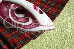 Electric iron and kilt