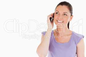 Attractive woman on the phone while standing