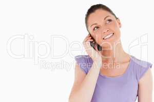 Beautiful woman on the phone while standing