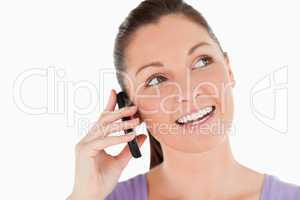 Portrait of a gorgeous woman on the phone while standing