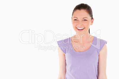Joyful female posing while standing